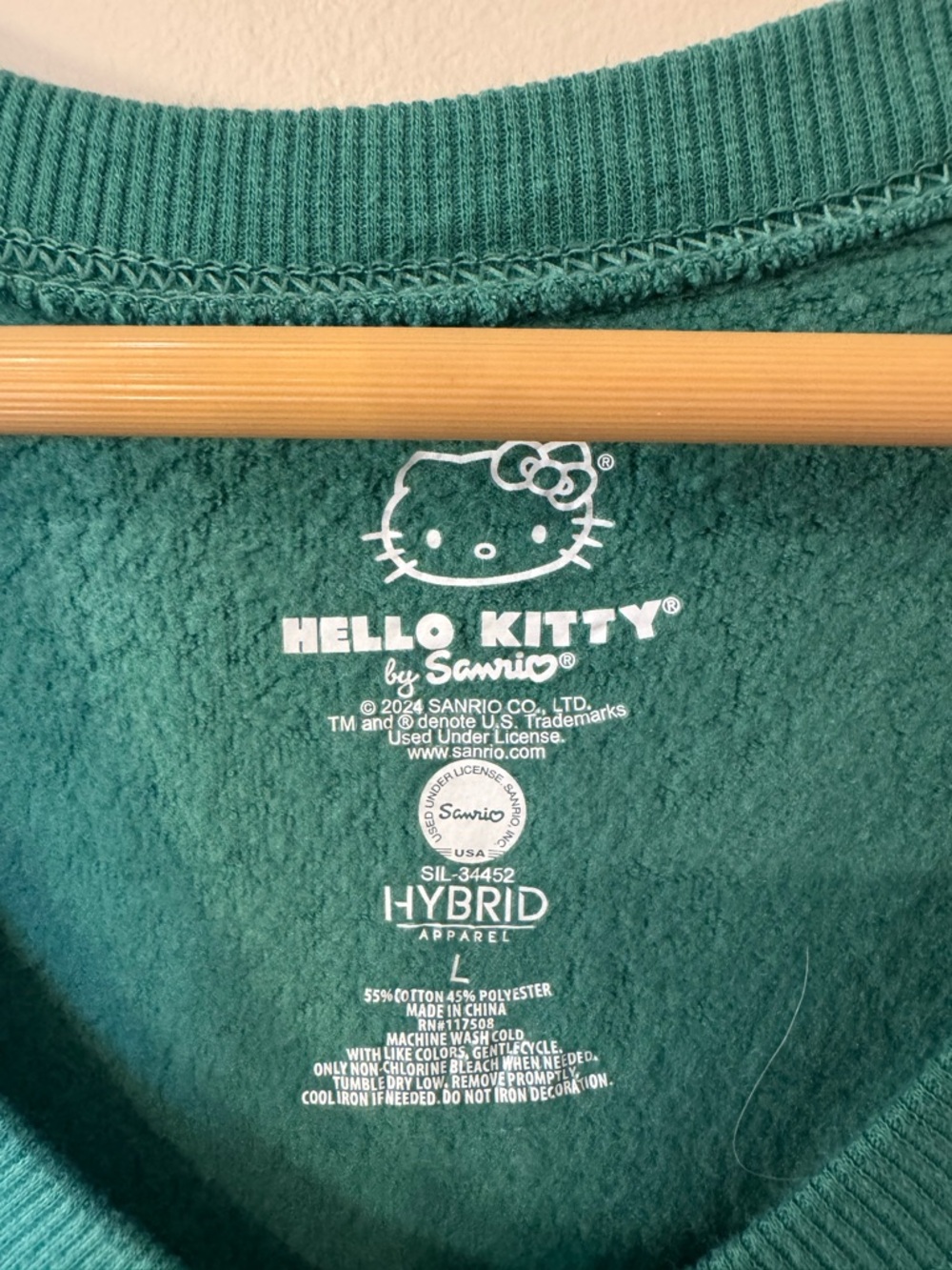 Hello Kitty Green Cropped Crewneck Sweatshirt with Pink & Blue Crest - Picture 6 of 6